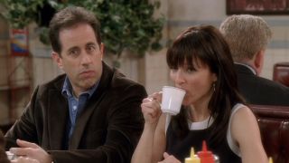 Jerry sitting next to Elaine, drinking a cup of coffee, at Monk's Diner in the Seinfeld reunion finale of Curb Your Enthusiasm
